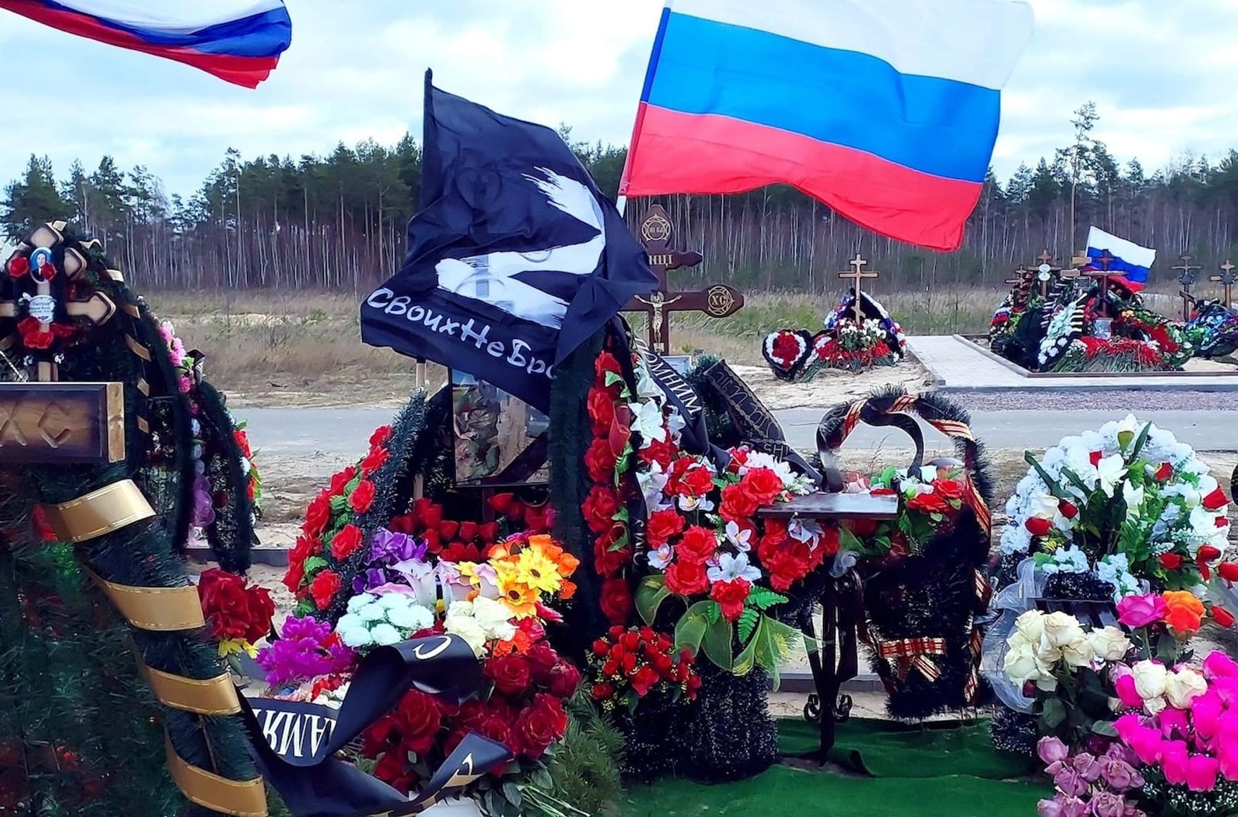 Cardboard coffins and countertop monuments: Russia is increasingly cutting costs on the burial of its war dead 