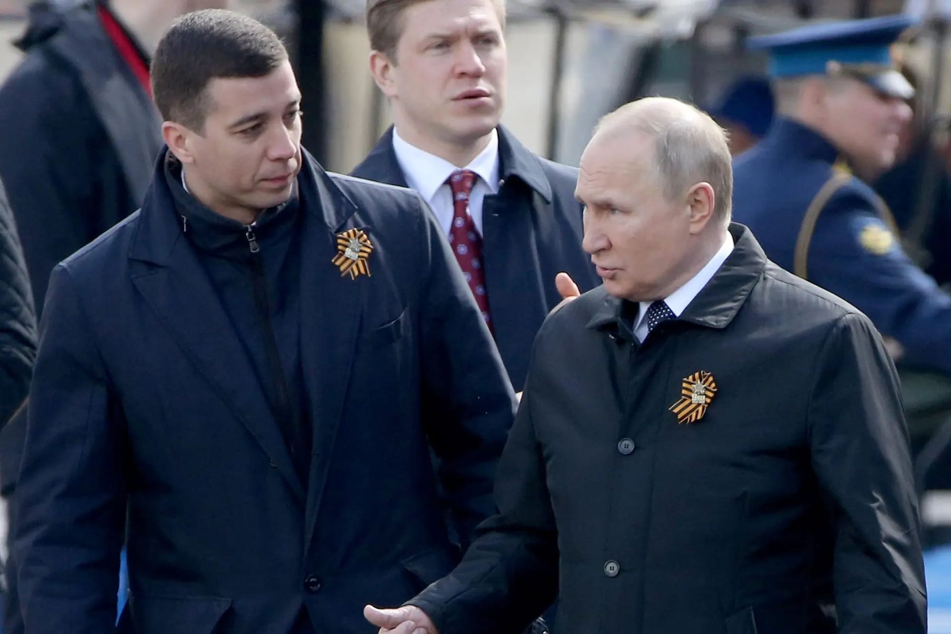 Dmitry Kovalev and Vladimir Putin at the Victory Day parade in Moscow