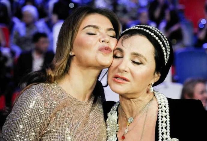 Former Olympic champion rhythmic gymnast Alina Kabaeva (left) — often referred to as Vladimir Putin's unofficial romantic partner and the mother of two of his sons — and her coach Irina Viner (right).