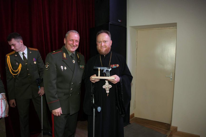 Alexei Lobeev's friend Anatoly Zhelnov is pictured to the left of General Staff Chief Oleg Belokonev