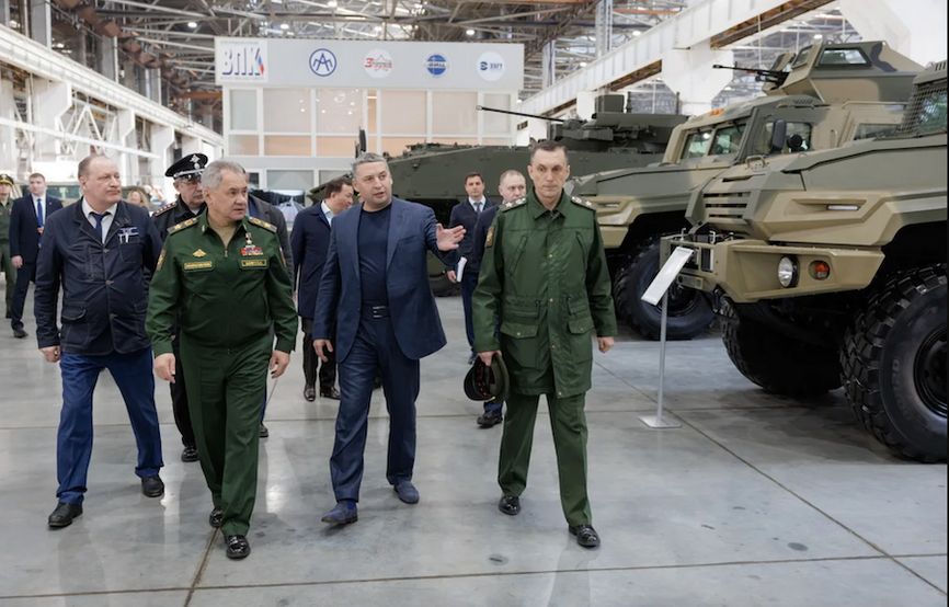 Sergei Shoigu tours the Arzamas Machine-Building Plant with its director Alexander Krasovitsky.