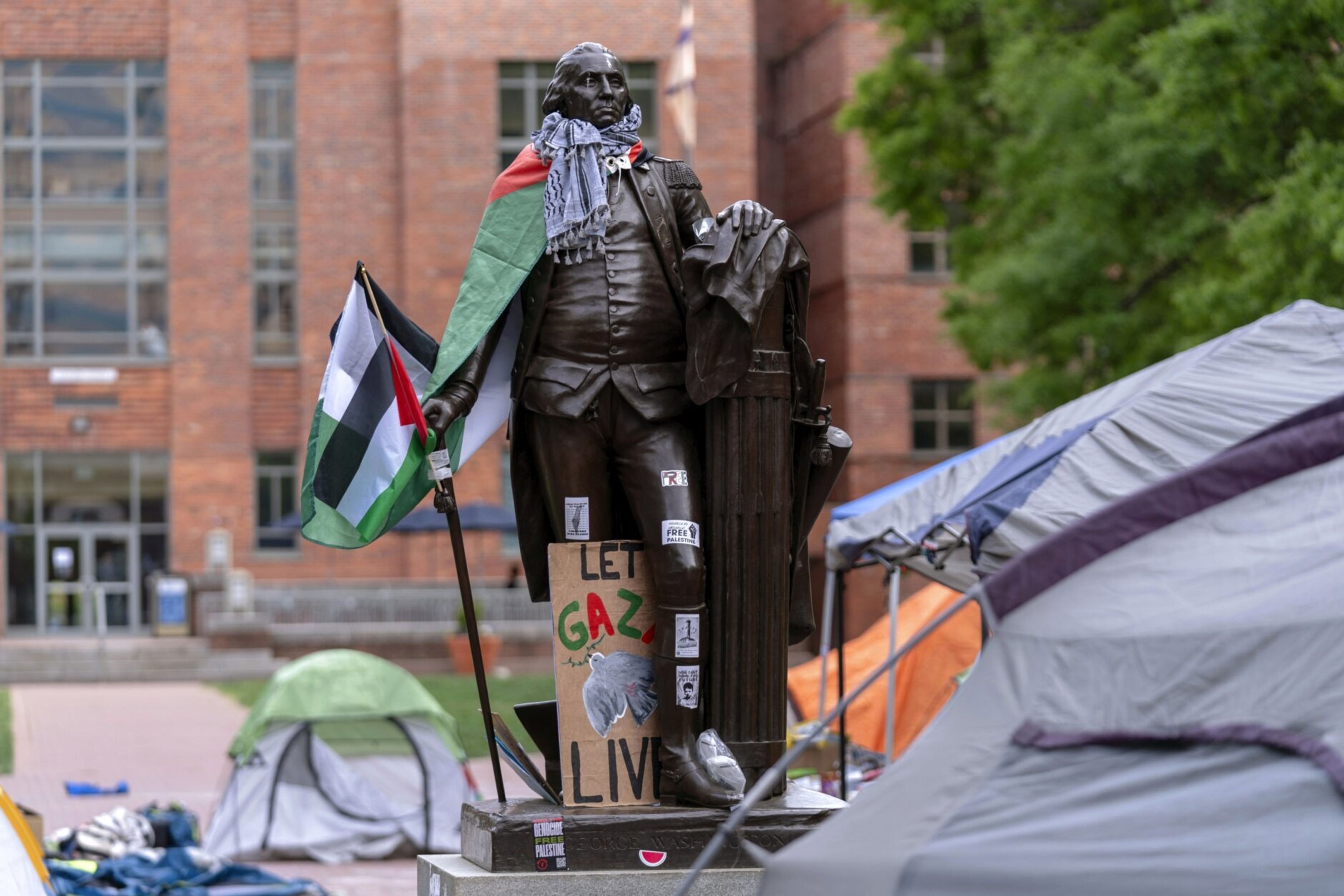 During pro-Palestinian protests, the statue of George Washington outside the university campus building was draped in a Palestinian flag and a keffiyeh.